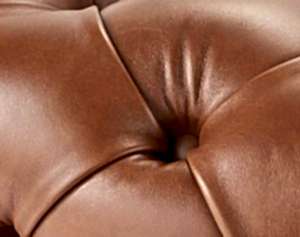 Sophie foot stool button close up